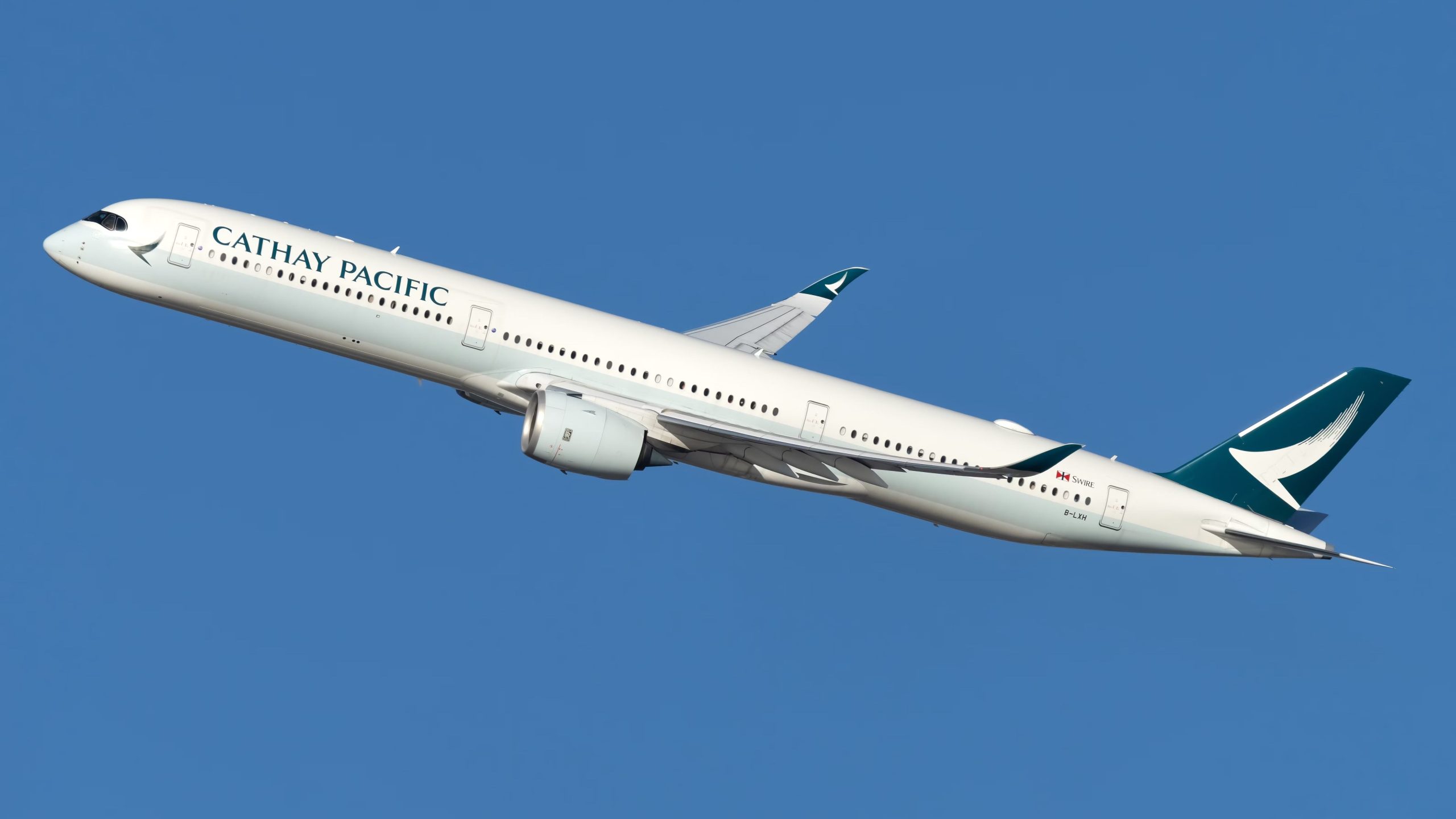 Cathay Pacific Airbus A350-1000 revient à Boston après que la cabine se remplisse de fumée